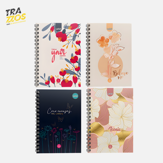 Cuaderno argollado grande Multimateria con pasta dura y diseños de florales con colores beige y rosado  morado. 
